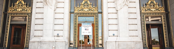  Entrance of City Hall with sign advertising Voting Center