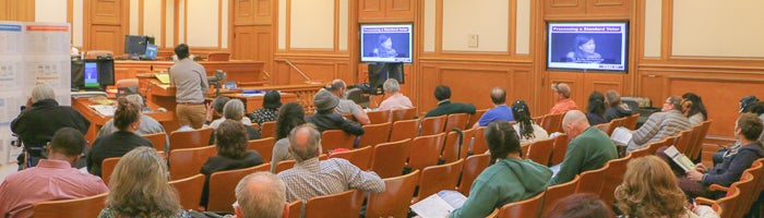Poll workers attending a training class at City Hall